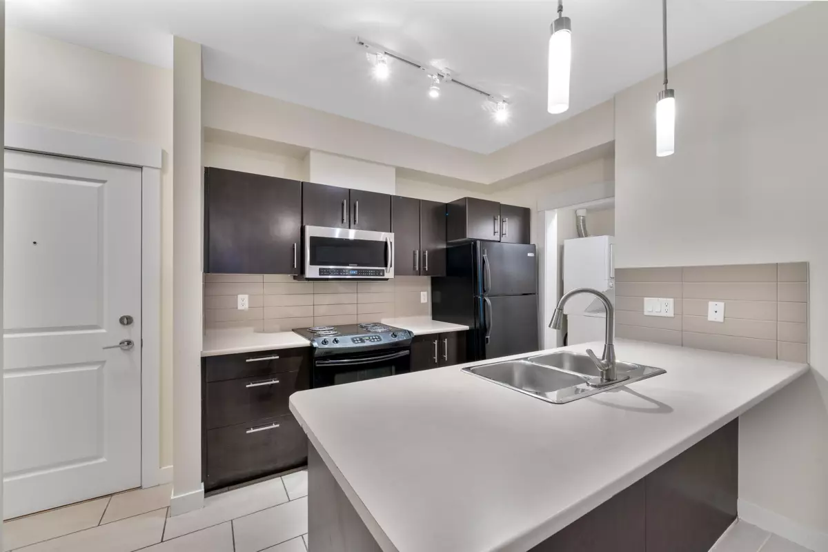 Living Room Photo of 217 33545 Rainbow Avenue, Abbotsford, BC