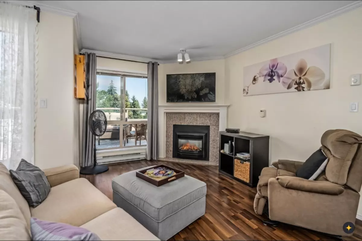 Family Room Photo of 407 33731 Marshall Road, Abbotsford, BC