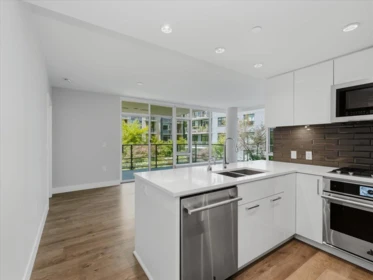 Kitchen Island Photo of 302 8533 River District Crossing, Vancouver, BC