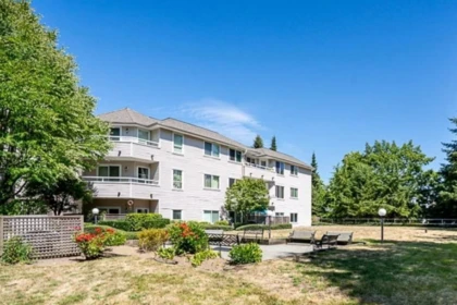 Exterior Rear Photo of 101 450 Bromley Street, Coquitlam, BC