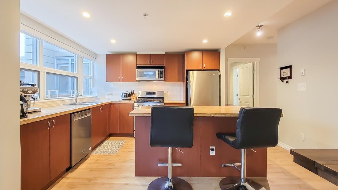 Kitchen Island Photo of 301 9266 University Crescent, Burnaby, BC