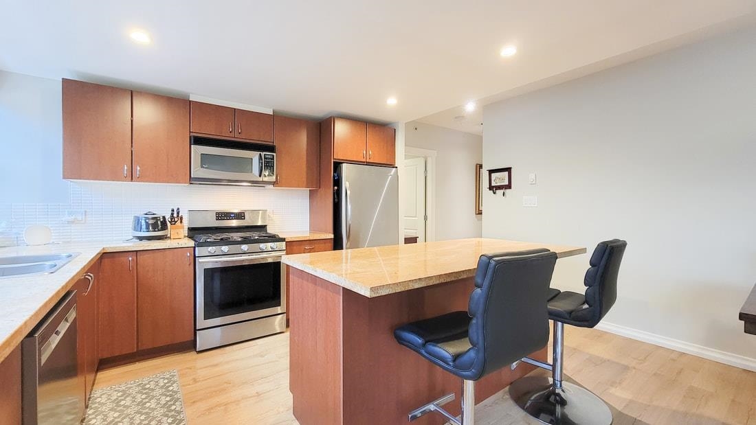 Kitchen Photo of 301 9266 University Crescent, Burnaby, BC