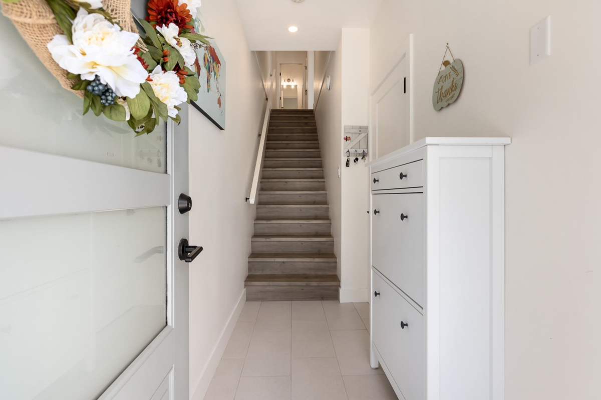 Living Room Photo of 8 8200 Foxfern Road, Chilliwack, BC