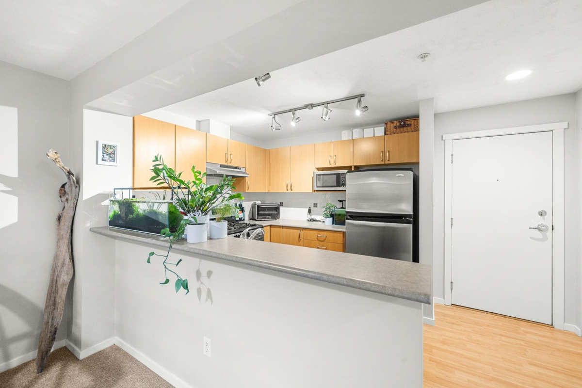 Living Room Photo of 208 200 Klahanie Drive, Port Moody, BC