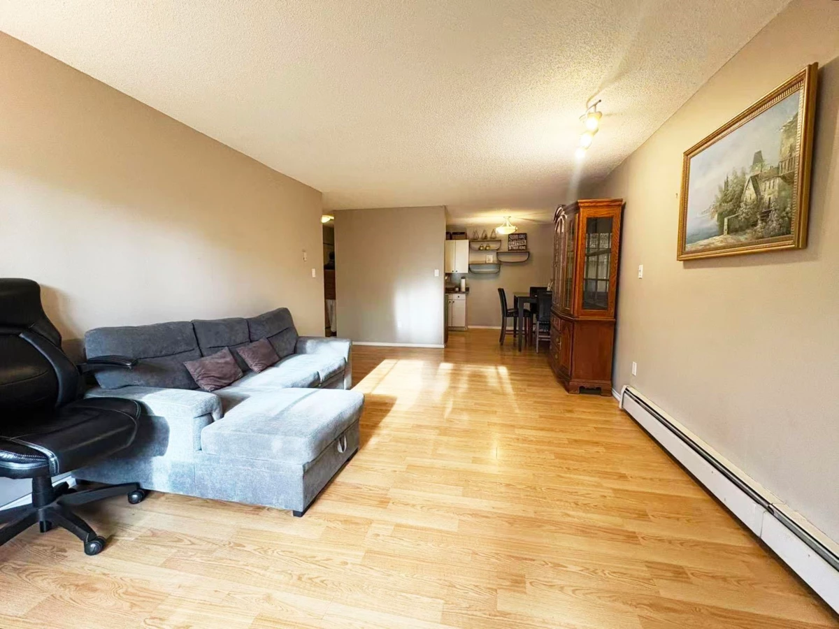 Living Room Photo of 102 7151 Edmonds Street, Burnaby, BC