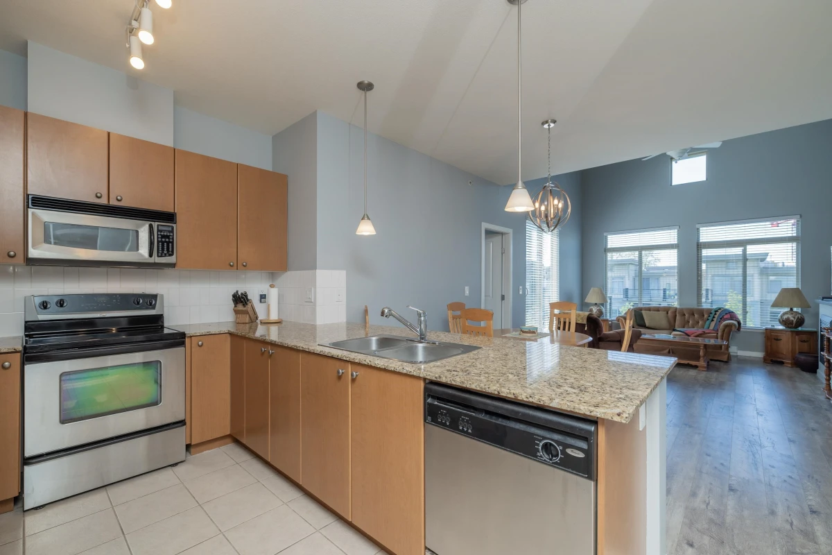 Family Room Photo of 430 15380 102a Avenue, Surrey, BC