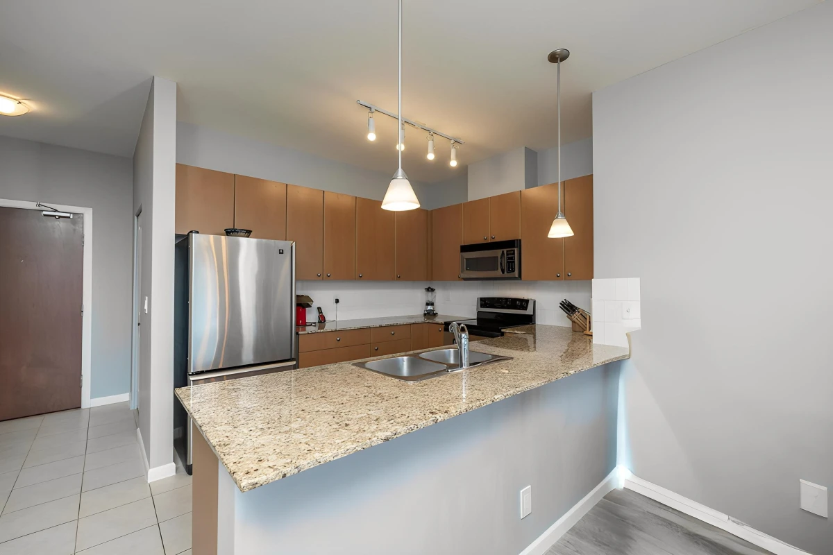 Living Room Photo of 430 15380 102a Avenue, Surrey, BC