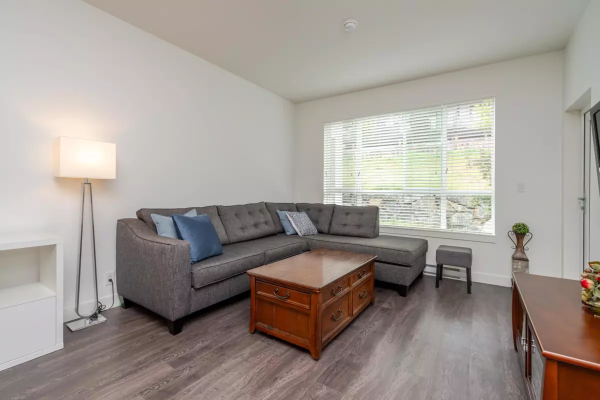 Family Room Photo of 209 16396 64 Avenue, Surrey, BC