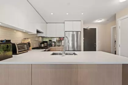 Kitchen Island Photo of 409 8508 Rivergrass Drive, Vancouver, BC