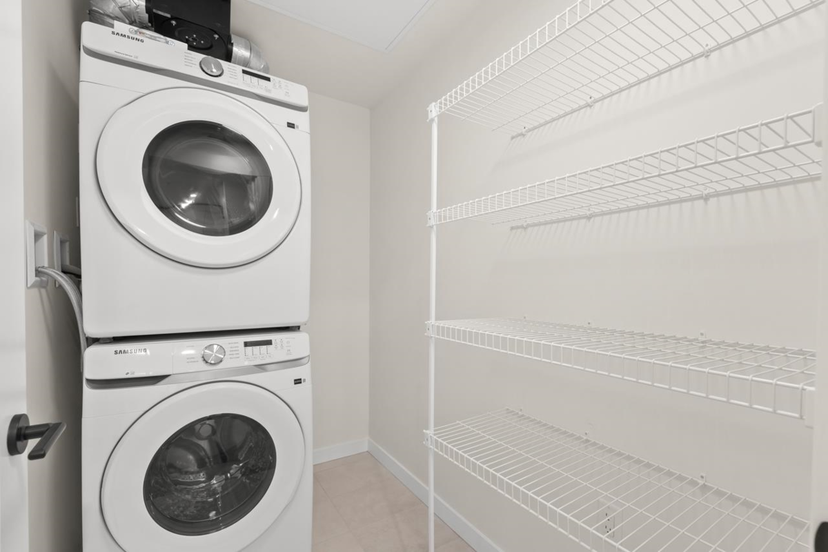 Laundry Room Photo of 410 27215 Aldergrove Town Centre Drive, Langley, BC