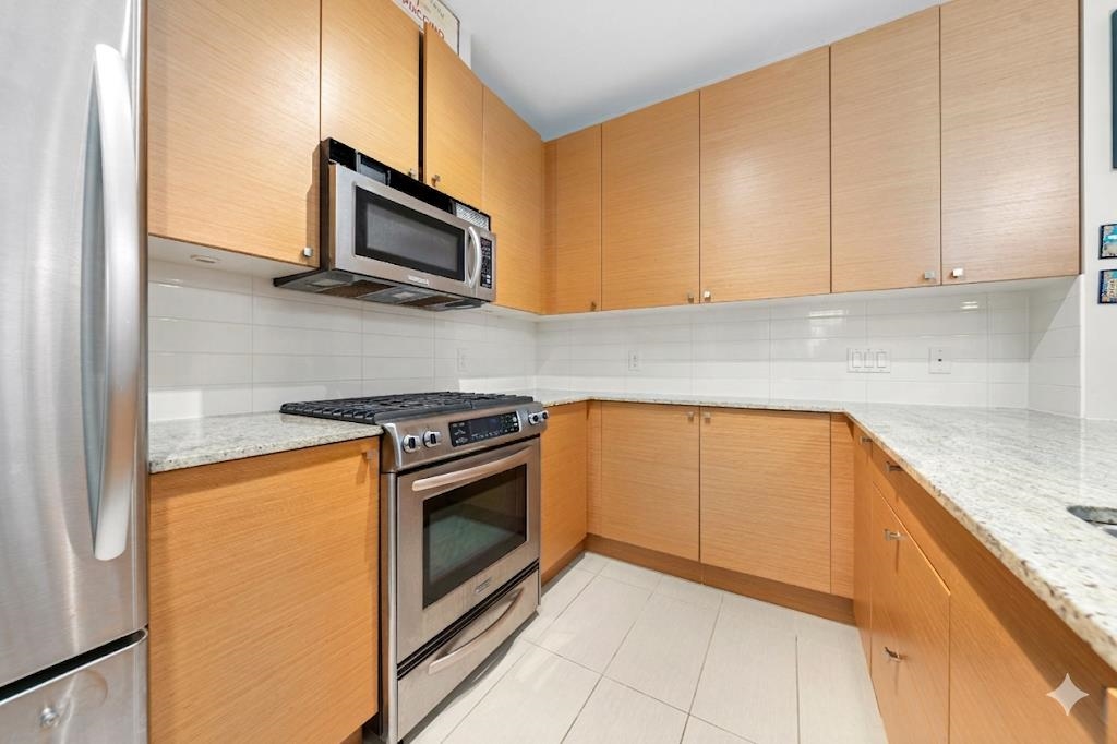 Family Room Photo of 411 201 Morrissey Road, Port Moody, BC