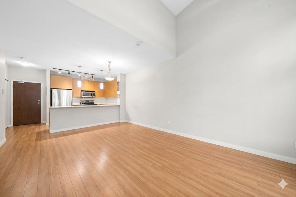 Living Room Photo of 411 201 Morrissey Road, Port Moody, BC