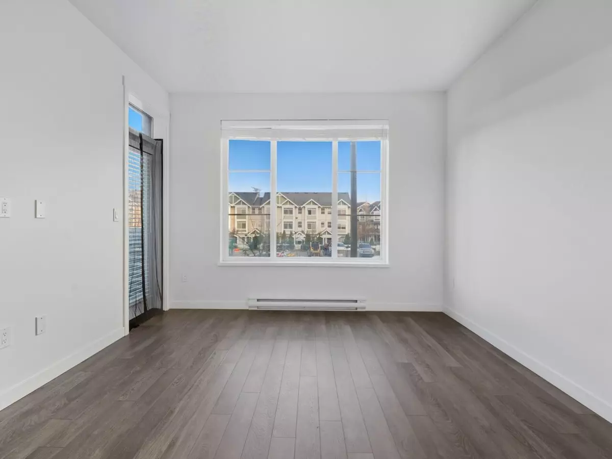 Living Room Photo of 203 15858 Fraser Highway, Surrey, BC