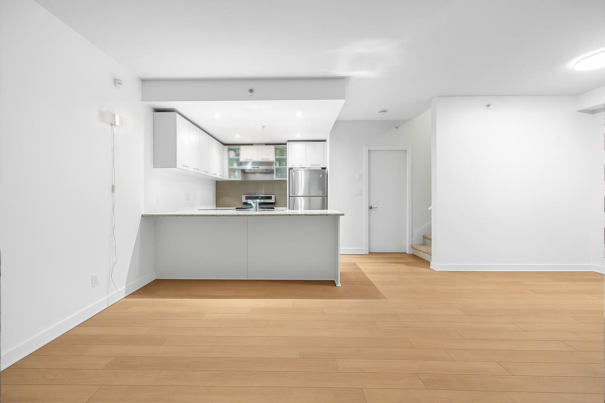 Exterior Rear Photo of 1 3111 Corvette Way, Richmond, BC