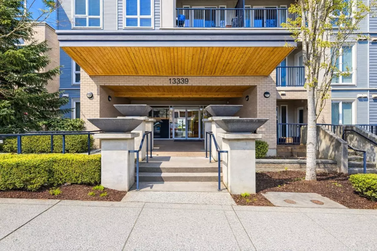 Living Room Photo of 203 13339 102a Avenue, Surrey, BC