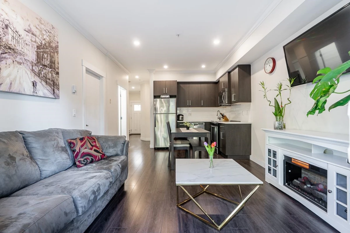 Family Room Photo of 7 7247 140 Street, Surrey, BC