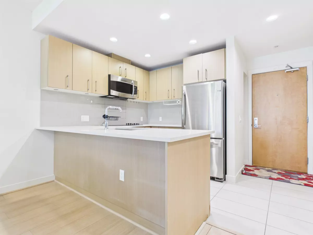 Living Room Photo of 303 5981 Gray Avenue, Vancouver, BC