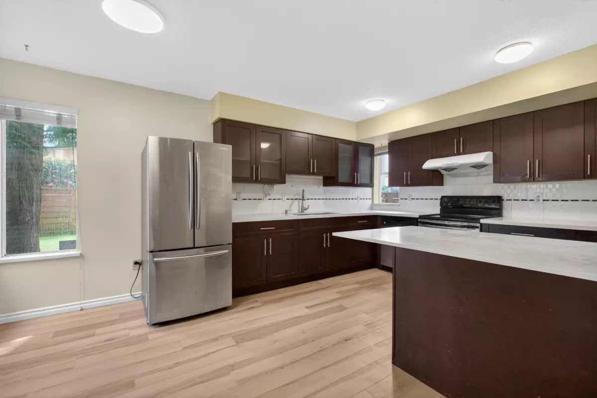 Family Room Photo of 8 7611 Moffatt Road, Richmond, BC