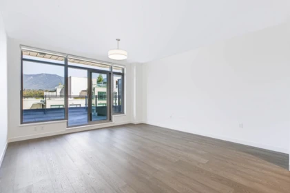 Family Room Photo of 704 777 Harbour Way, Vancouver, BC