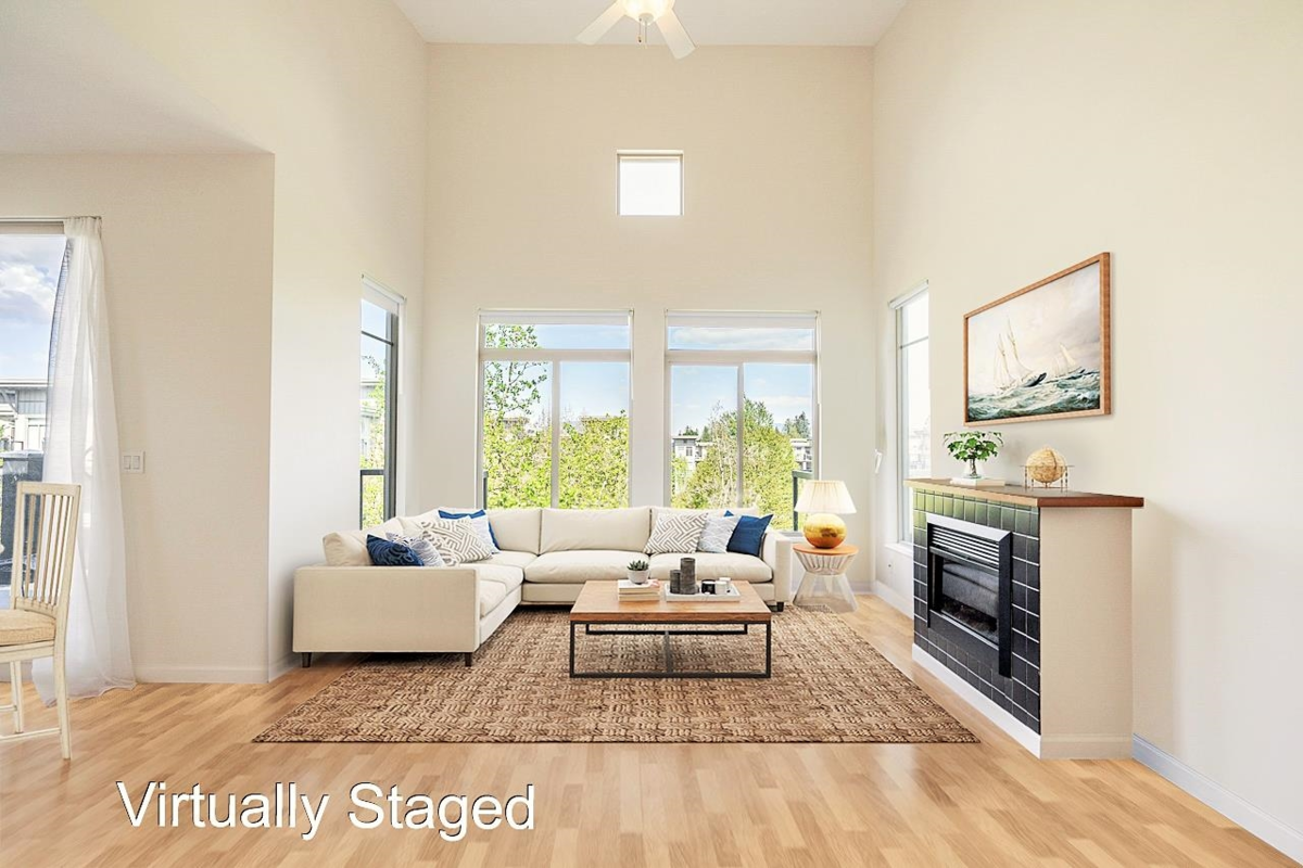 Family Room Photo of 418 15385 101a Avenue, Surrey, BC