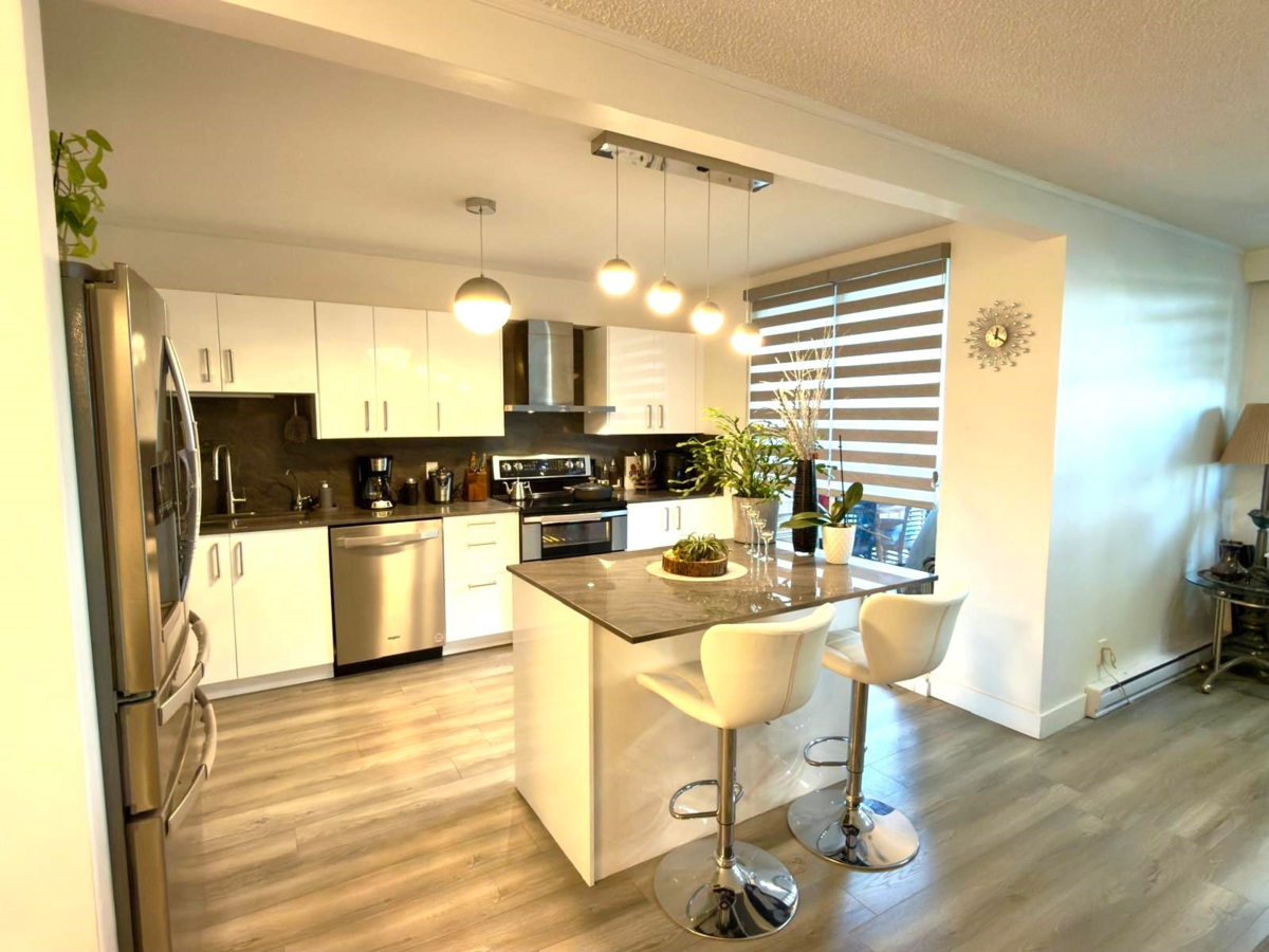 Living Room Photo of 301 555 Austin Avenue, Coquitlam, BC