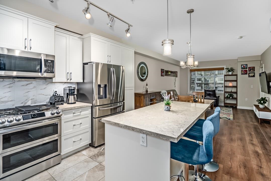 Basement Recreation Room Photo of 309 8561 203a Street, Langley, BC