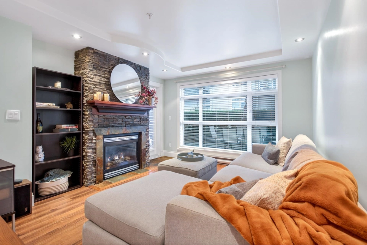 Living Room Photo of 102 3122 St Johns Street, Port Moody, BC
