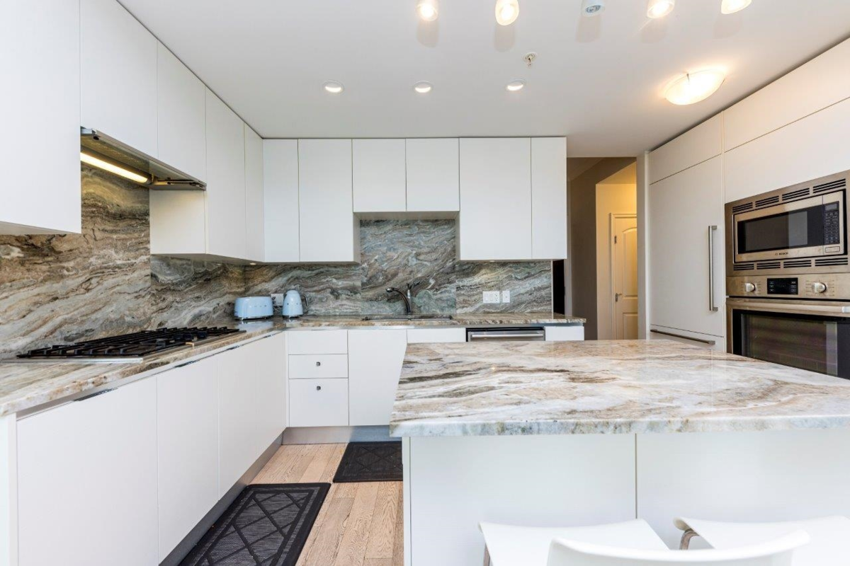 Kitchen Island Photo of 304 175 Victory Ship Way, North Vancouver, BC