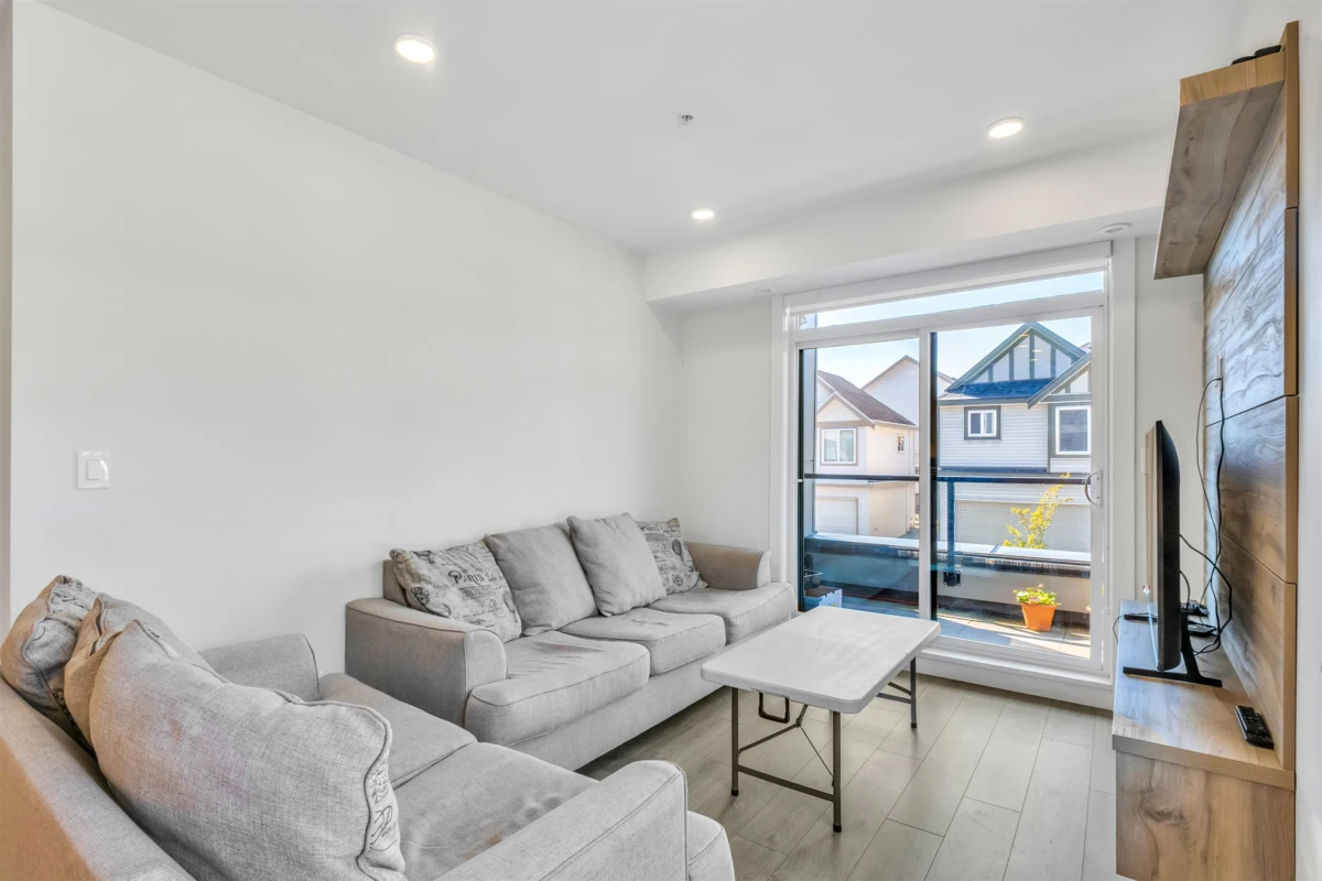 Family Room Photo of 212 14818 60 Avenue, Surrey, BC