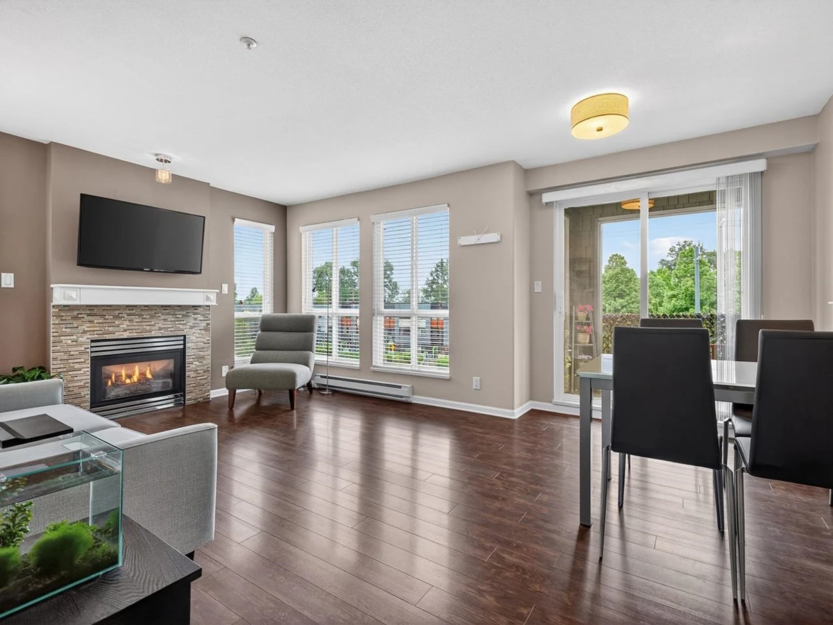 Family Room Photo of 310 8495 Jellicoe Street, Vancouver, BC