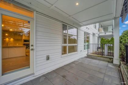 Laundry Room Photo of 109 6677 Cambie Street, Vancouver, BC