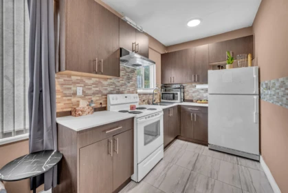 Basement Recreation Room Photo of 20692 River Road, Maple Ridge, BC