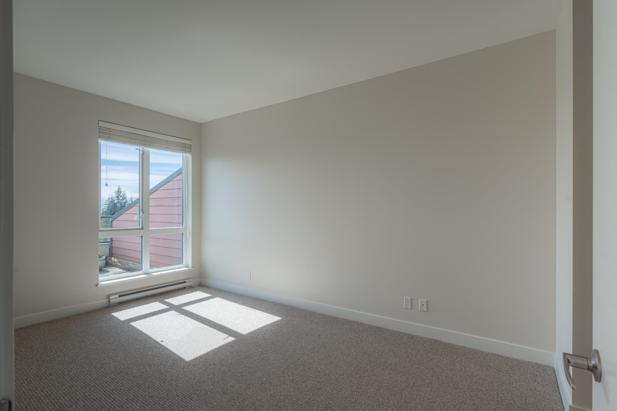 Basement Recreation Room Photo of 208 875 Gibsons Way, Gibsons, BC