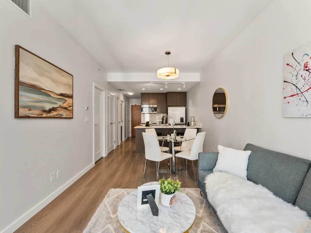 Living Room Photo of 711 8628 Hazelbridge Way, Richmond, BC