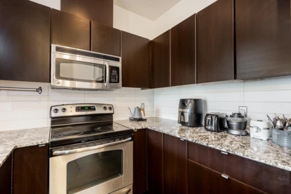 Kitchen Photo of 410 9655 King George Boulevard, Surrey, BC