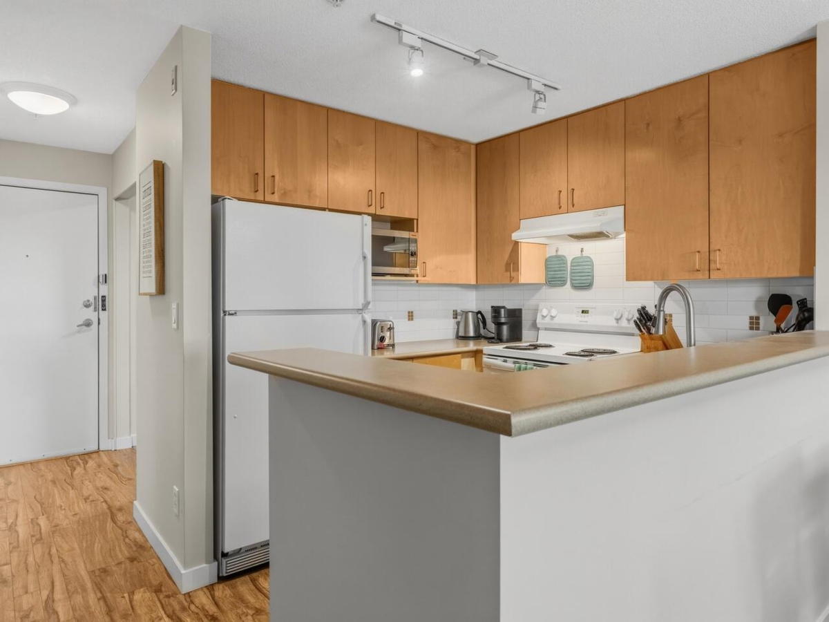 Dining Area Photo of 402 124 W 3rd Street, North Vancouver, BC