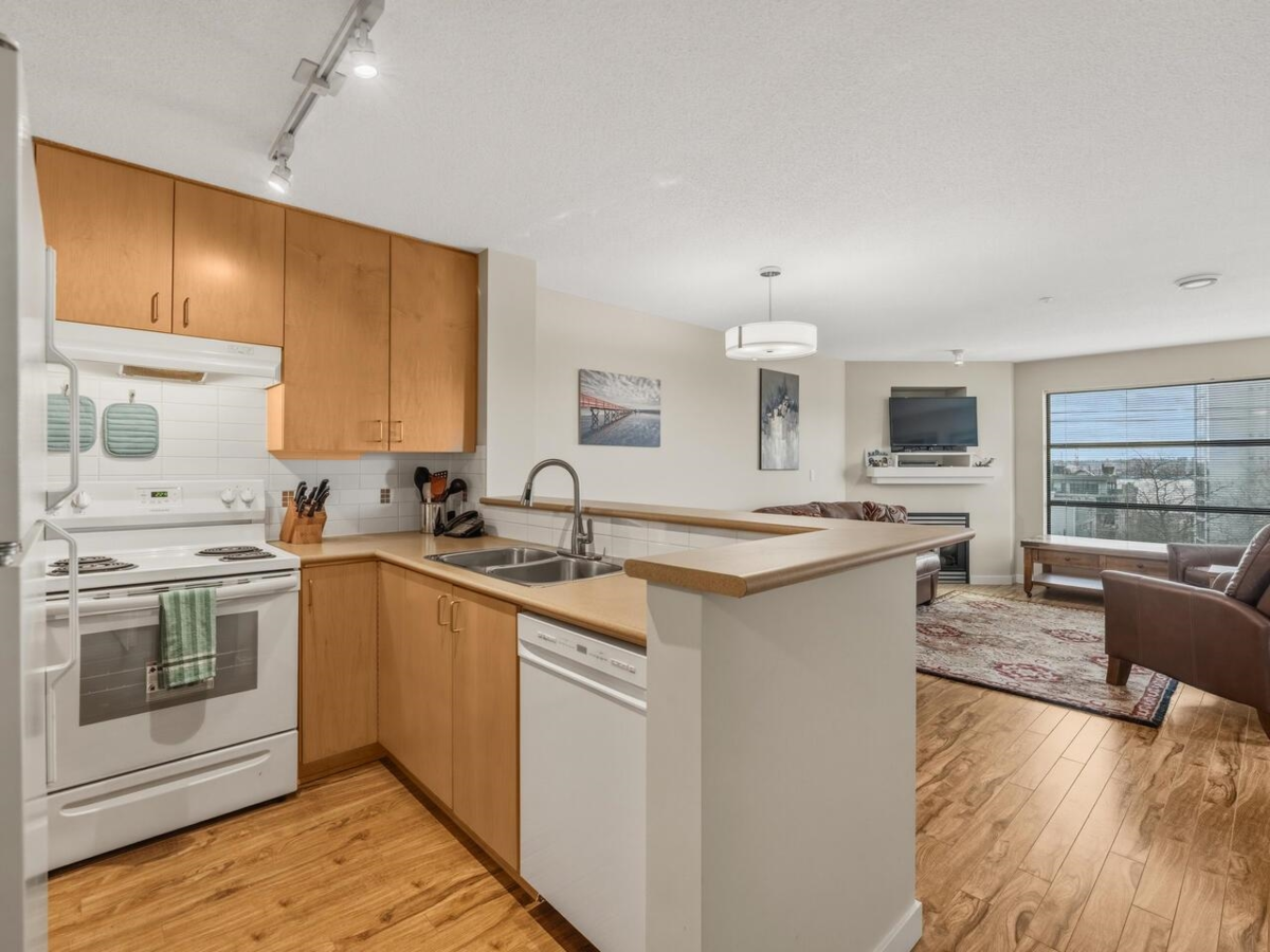 Living Room Photo of 402 124 W 3rd Street, North Vancouver, BC