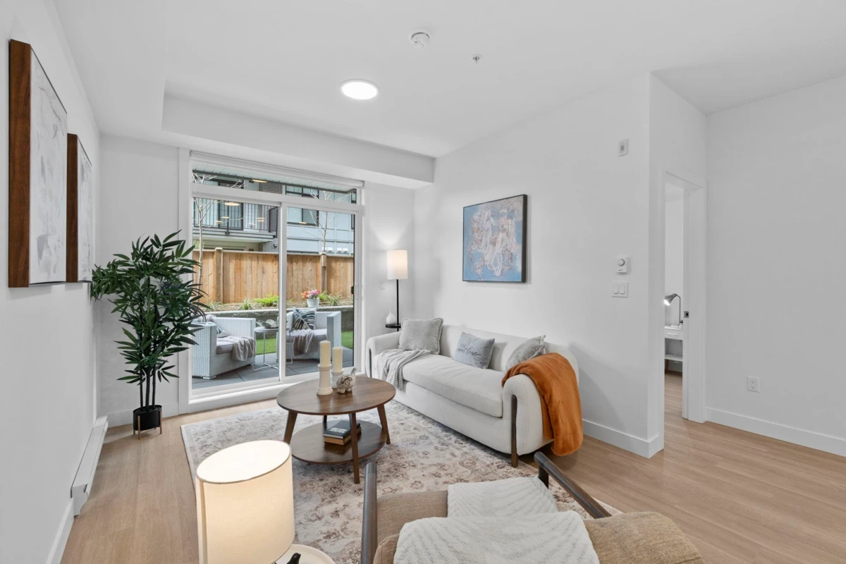Living Room Photo of 209 33820 South Fraser Way, Abbotsford, BC