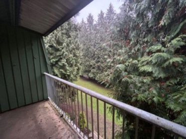 Front exterior of 313 3901 Carrigan Court, Burnaby, BC