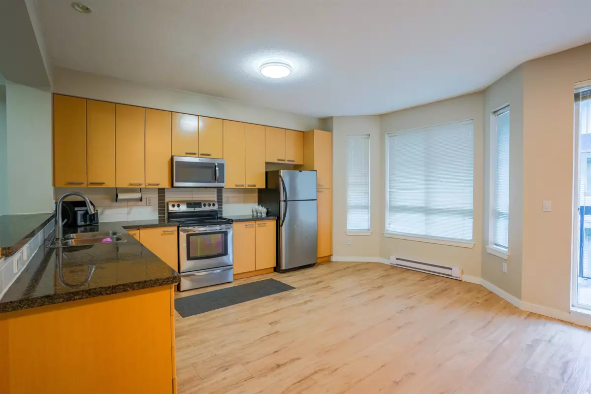 Family Room Photo of 15 7155 189 Street, Surrey, BC