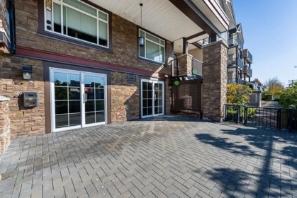 Living Room Photo of 407 19939 55a Avenue, Langley, BC