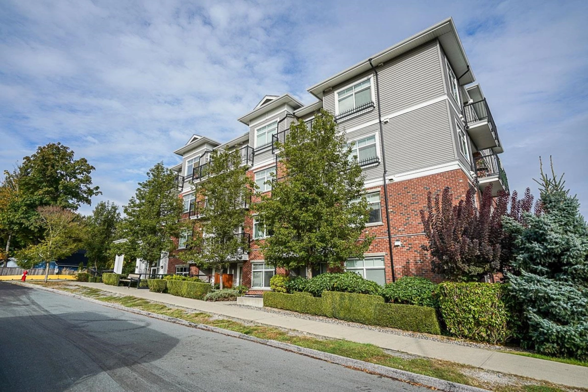 Living Room Photo of 316 6480 195a Street, Surrey, BC