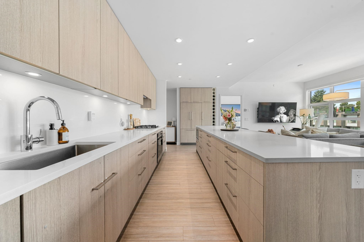 Family Room Photo of 413 747 E 3rd Street, North Vancouver, BC