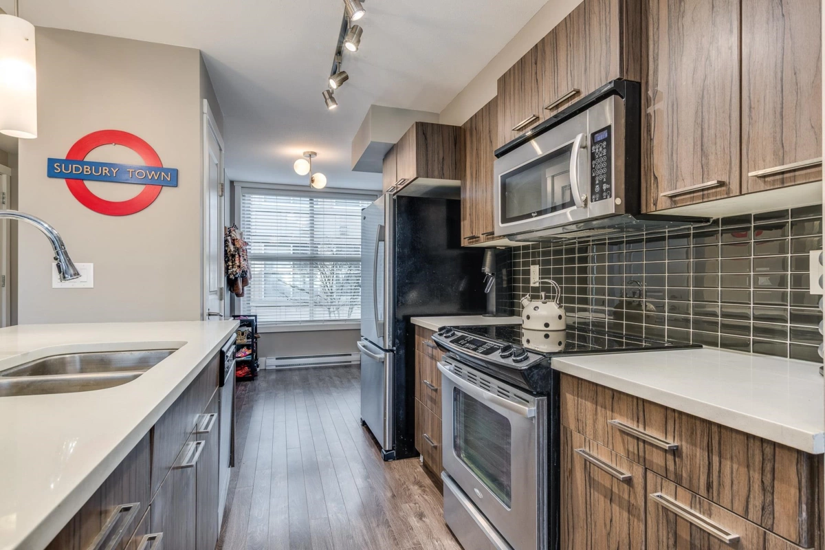 Living Room Photo of 208 2110 Rowland Street, Port Coquitlam, BC