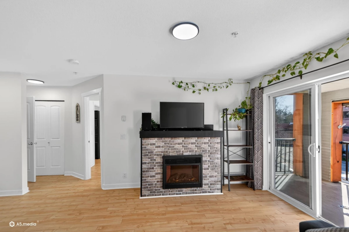 Living Room Photo of 315 6960 120 Street, Surrey, BC