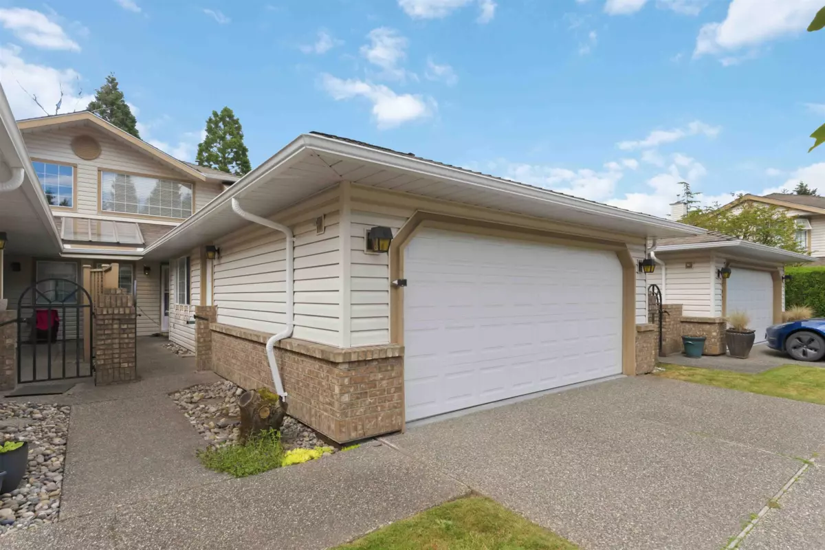 Living Room Photo of 108 9715 148a Street, Surrey, BC
