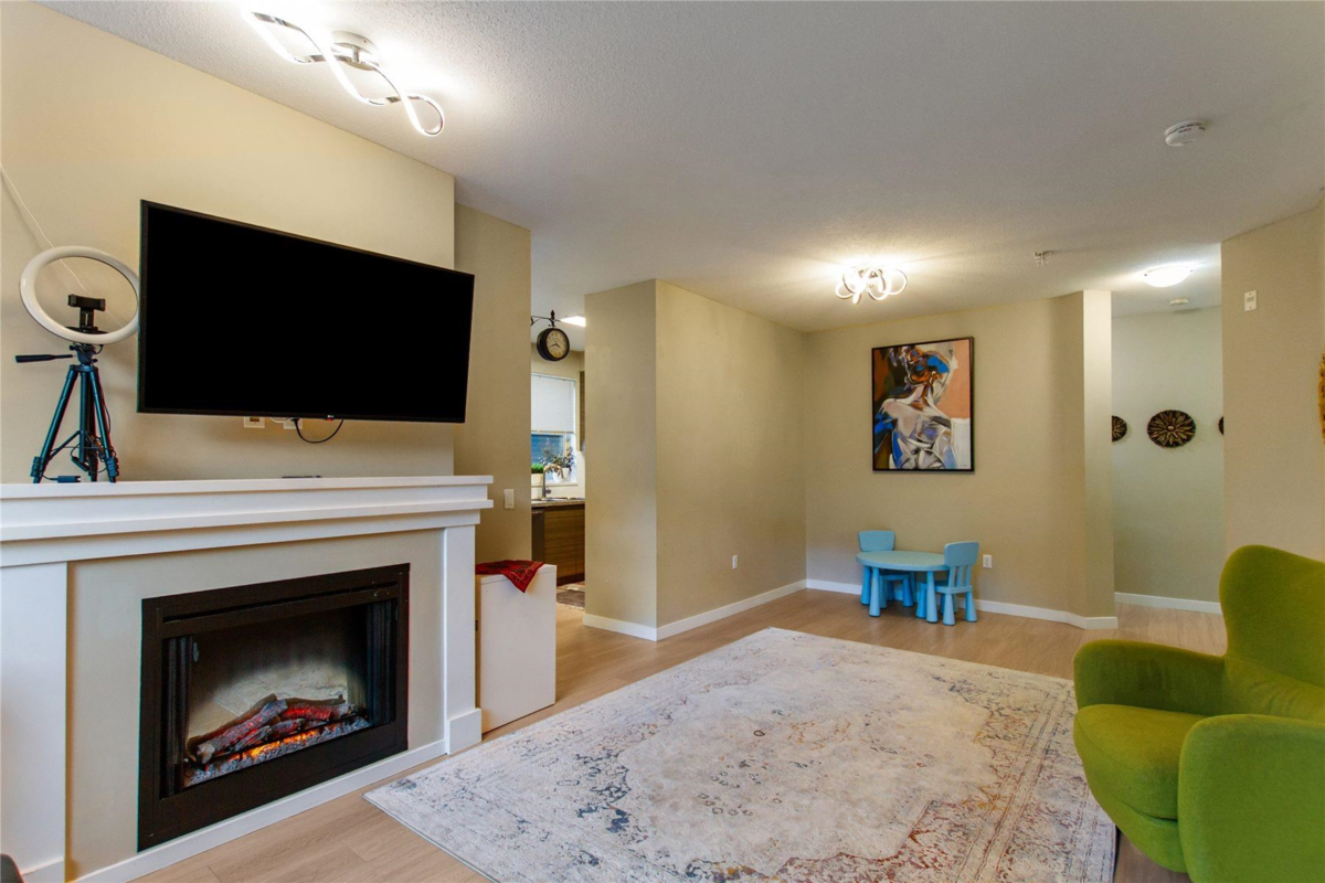 Family Room Photo of 105 1150 Kensal Place, Coquitlam, BC