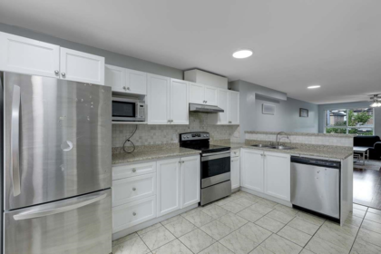 Basement Recreation Room Photo of 2 12730 66 Avenue, Surrey, BC