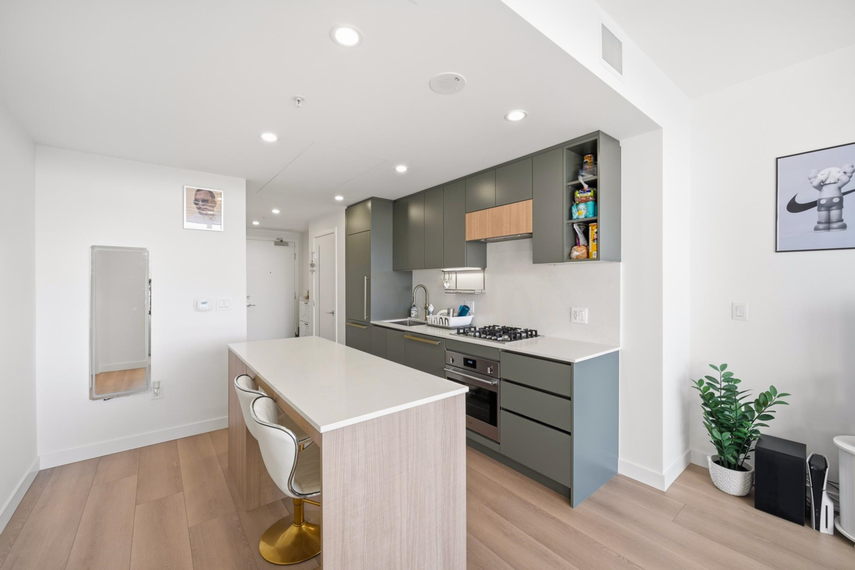 Living Room Photo of 607 13573 98a Avenue, Surrey, BC