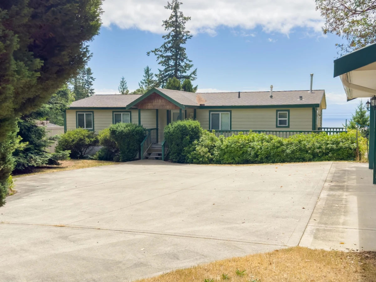 Exterior Rear Photo of 8097 Redrooffs Road, Halfmoon Bay, BC